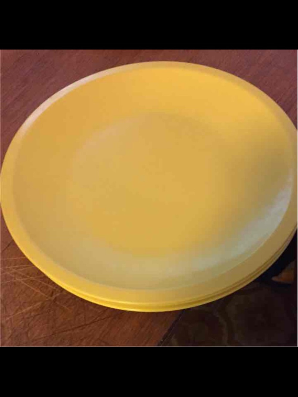 Set of Bright Yellow Plastic Dinner Plates